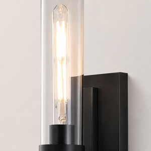 Lámpara de pared para baño, con pantalla de cristal cilíndrica transparente y metal negro, para uso residencial y hotelero, montaje en pared interior. - Product Image 6