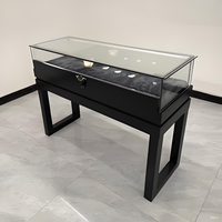 Finition miroir Laque Texture LED Compteur de bijoux Conception de logo intégré personnalisé Nettoyage facile Matériau MDF Marque de luxe Vitrine