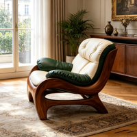 Fauteuil de détente contemporain élégant à silhouette courbée, avec coussin moelleux et accoudoirs capitonnés, pour la maison, l'hôtel et l'usage commercial