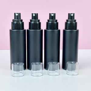 Fancy <b>Empty</b> Cylinder Round 30ml 50ml 60ml 100ml 120ml Matte Black Glass Cosmetic Emulsion Bottles Packaging With Pump - Product Image 5