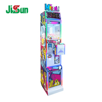Machine à griffes Mega Mini Crane avec accepteur de pièces, distributeur de jouets, support espagnol et anglais, construction en plastique et métal, garantie 1 an