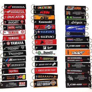 <span class=keywords><strong>Porte</strong></span>-<span class=keywords><strong>clés</strong></span> moto étiquette tissée brodée courte bande de tissu pendentif tendance pour voiture Logo chapeau vêtements matériau métallique durable - Product Image 1