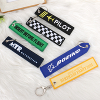 Porte-clés de voiture de luxe de qualité supérieure, personnalisable avec logo, porte-clés d'avion, cadeau suspendu, porte-clés brodé pour vêtements, fabrication en usine à prix avantageux