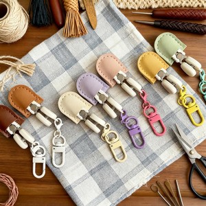 Mini ciseaux ménagers de style japonais avec sac de rangement, couleur unie, garnitures en fil brodé. - Product Image 1