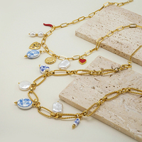 Bijoux en acier inoxydable plaqué or 18 carats collier à breloques multi-pompons uniques pendentifs en forme de cœur de perle imperméable à l'eau P253573