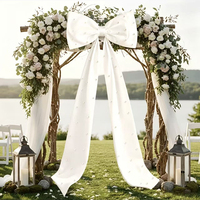 Décoration murale en gros avec nœud en satin surdimensionné et perles, grand nœud en tissu avec perles pour arrière-plans de photos de mariage et d'anniversaire