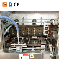 Ligne de production de coques à tarte en acier inoxydable contrôlée par PLC, état neuf, machine à fabriquer des biscuits