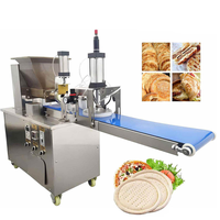Machine automatique de fabrication de base pour pizza Machine de fabrication de base pour pizza congelée Coupe-pâte et séparateur de pâte rond