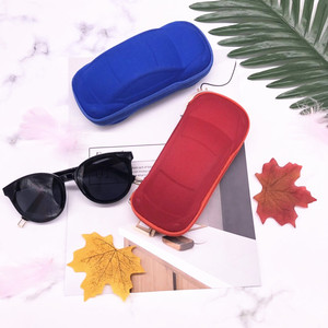 Étui à lunettes de soleil pour enfants Xinpeng en EVA, couleur unie, style voiture, pour la protection des lunettes des enfants - Product Image 2