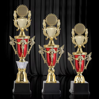 Piala Kompetisi Plastik untuk Lomba Puisi, Lomba Matematika, Lomba Lukis, dan Piala Kenangan Anak-Anak