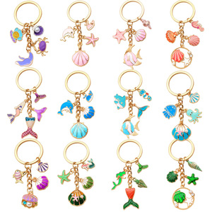 Nuova Serie Marina Transfrontaliera: Portachiavi con Stella Marina, Tartaruga e Sirena con Effetto Gocciolante, Ciondolo per Zaino e Auto - Product Image 1