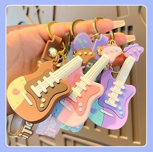 Llavero de guitarra al por mayor, bonito y moderno, llavero de instrumento musical, colgante de PVC para bolso, accesorios, regalos - Product Image 4
