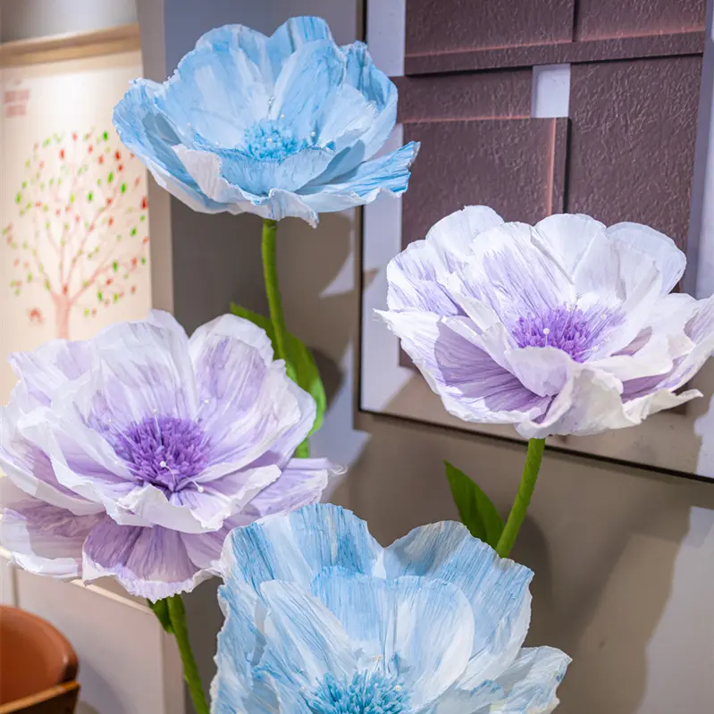 Les activités de Mei Chen étaient décorées de fleurs géantes. 2024 nouveaux accessoires de mariage, fleurs en papier faites à la main de jeune sirène.