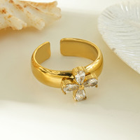 Bague ajustable large en acier inoxydable plaqué or pour femme, ornée de zircons en forme de trèfle à quatre feuilles, idéale pour superposer et offrir