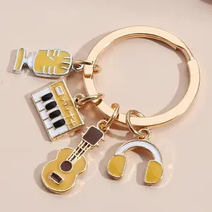 创意小香风小提琴音符键盘耳机钥匙圈背包吊坠钥匙链