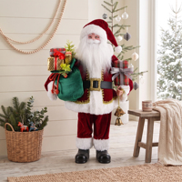 Figurine du Père Noël en velours rouge foncé avec bordure dorée et sac vert avec clochettes pour l'affichage dans les hôtels