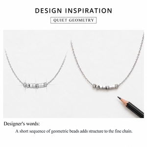 Collier de perles géométriques en acier inoxydable, chaîne fine argentée avec détail facetté central - Product Image 2