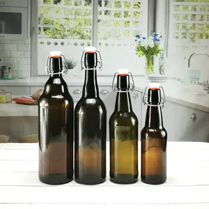 Botella de vidrio de aceite de cerveza de 18oz con sello personalizado fácil de abrir con tapa superior oscilante