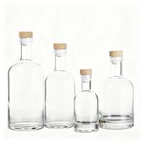 Bouteille à liqueur ronde en verre transparent avec bouchon en caoutchouc vide pour whisky, vin, vodka, gin, rhum et boissons aux fruits