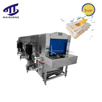 Laveuse industrielle de boîtes en plastique pour abattoirs de volailles Machine de nettoyage de cages à poulets Machine à laver les couvoir et les caisses
