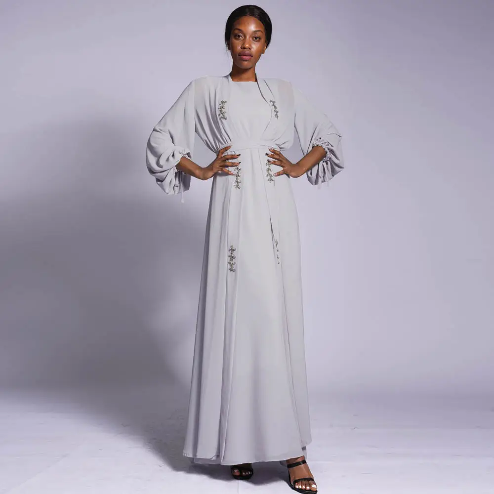 Nouvelles robes musulmanes perlées de couleur unie pour femmes Derniers modèles de robes abaya en mousseline de soie