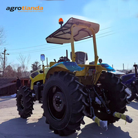 Tracteur 4x4 robuste jaune de 100 CV avec pare-soleil pour les grandes exploitations agricoles