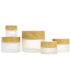 Creme para o rosto de cosméticos fosco frascos de cosméticos recipiente de bambu com tampas 30g 50g âmbar azul claro 100ml frasco de vidro com tampa de bambu