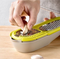 Offre Spéciale créatif multifonctionnel 2-en-1 en acier inoxydable presse-agrumes manuel presse-citron Melon fil râpe lave-vaisselle produit de cuisine