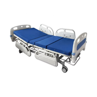 Lit d'hôpital moderne pliable et réglable avec barreaux en aluminium et tête de lit en PP, base en acier durable, construction métallique