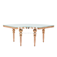 Table à manger serpentine dorée et blanche avec dessus en verre blanc pour hôtels, restaurants, mariages et utilisation en extérieur