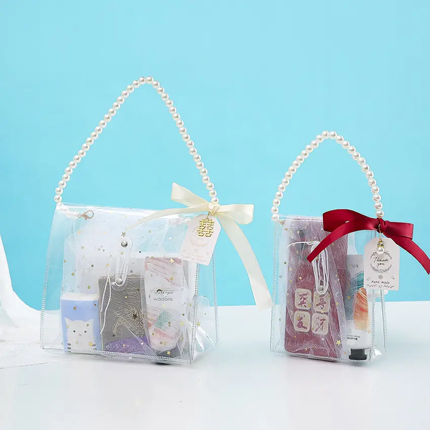 Souvenir di nozze damigelle regali scatole di caramelle sacchetti di PVC imballaggio con manico di perle piccoli sacchetti regalo