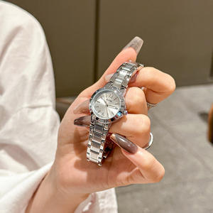 Reloj de pulsera para mujer de acero inoxidable, elegante reloj de cuarzo con indicador de fecha, reloj de pulsera moderno. - Product Image 1