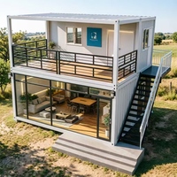 Maison conteneur démontable à deux niveaux, cabane blanche avec pieds de nivellement, montage rapide et portable pour chantier de construction et campement