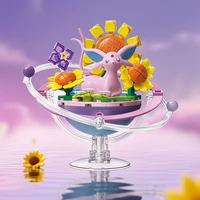 Série Eevee Planet - Blocs de construction - Support rotatif pour diorama - 9 figurines complètes Eeveelution - Boîte mystère cadeau pour enfants