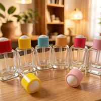Flacon compte-gouttes rond en verre transparent à prix d'usine avec bouchon en plastique coloré, rechargeable, logo personnalisé, emballage cosmétique en gros