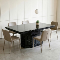 Table à manger géométrique moderne avant-gardiste à base lourde en marbre Nero Marquina pour salles à manger de villas de luxe et espaces artistiques de créateurs