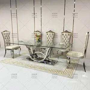 Modern luxury 6 8 10 seater glass dining tables wholesale price dinning room silver stainless steel frame table set