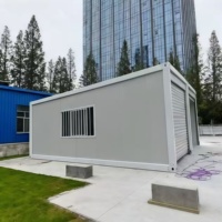Maison mobile de conteneur de boîte de garage de voiture en acier préfabriquée portative moderne avec la porte de volet de roulement pour des entrepôts