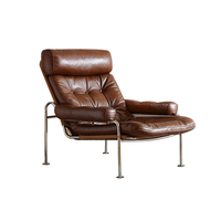 Fauteuil de salon en cuir de cire d'huile de cadre d'acier inoxydable d'art de conception classique pour la zone de réception de lobby de salon