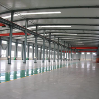 Bâtiment modulaire préfabriqué léger en structure d'acier, kit d'entrepôt, d'usine logistique, de grange, d'atelier ou de hangar à ossature métallique