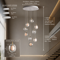 Lustre moderne en cristal en spirale, luminaire suspendu pour longue escalier, idéal pour villa à plafond haut ou salon duplex