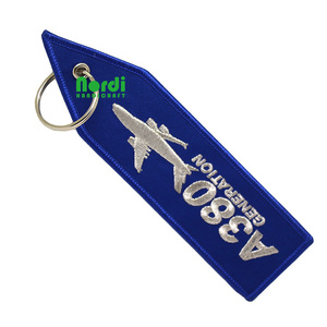2025 Giá Rẻ Tùy Chỉnh Cá Nhân Logo Máy Bay Thêu Keychain Vải Dệt Key Tag Máy Bay Phản Lực Tag Dounl Hai Mặt Thêu Móc Chìa Khóa - Product Image 1