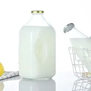 Bottiglie per il latte in vetro pesante trasparente a pietra focaia di forma quadrata all'ingrosso 2 brocche da 64 once con coperchi Extra