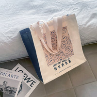 Sac fourre-tout grande capacité à imprimé visage souriant de dessin animé, sac à bandoulière zippé en toile, sac à dos d'école pour étudiant, porte-documents