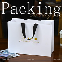 Emballage biodégradable de luxe, possibilité de personnaliser son propre logo, sac cadeau en papier kraft plaqué or avec poignée en corde