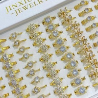 Bague de fiançailles tendance en laiton plaqué or 24 carats avec zircon et motifs géométriques incrustés pour femme - Vente en gros