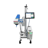 Machine de marquage laser à fibre en ligne 30w 50w Imprimante laser de code de lot de date pour boîtes d'emballage Câble Fil Pp Pe Pvc Tube