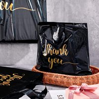 Sacs de marchandises de remerciement en vrac durables avec poignée Paquet de provisions en plastique pour les chaussettes et les chaussures de la boutique