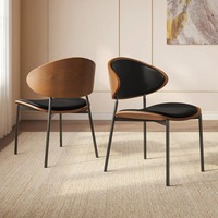 Chaise de salle à manger moderne à dossier incurvé avec dossier en métal, assise souple, pieds en acier - Meubles de salle à manger écologiques et durables