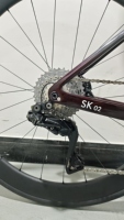 Vélo de route professionnel en fibre de carbone aérodynamique avec transmission électronique premium 24 vitesses pour le cyclisme professionnel